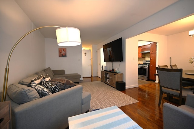 living room featuring dark hardwood / wood-style floors