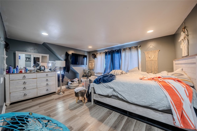 bedroom featuring light hardwood / wood-style floors