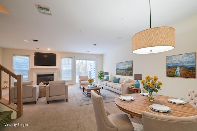 view of carpeted dining space