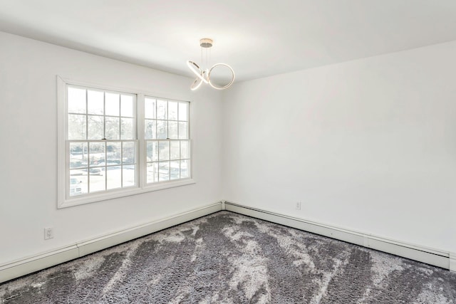 unfurnished room with carpet, a baseboard heating unit, and a notable chandelier