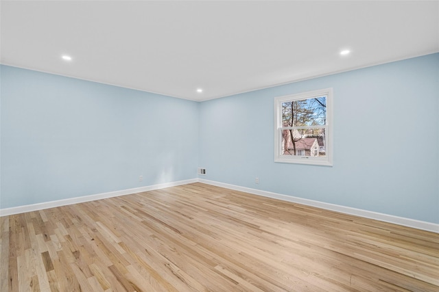 unfurnished room featuring light hardwood / wood-style floors