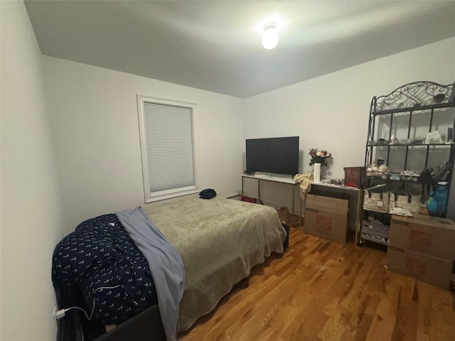 bedroom featuring hardwood / wood-style flooring