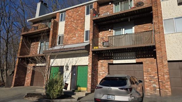 view of building exterior with a garage