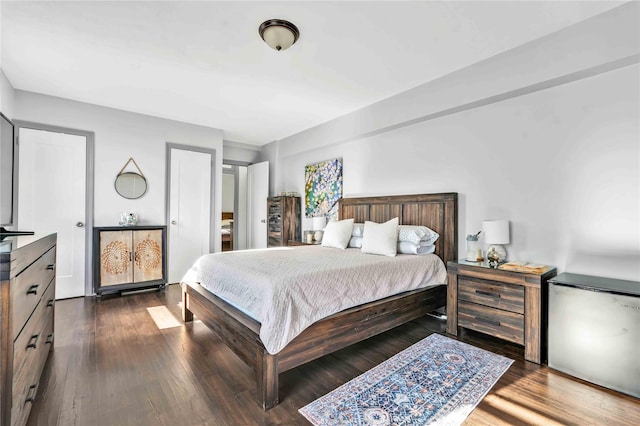 bedroom featuring dark wood-type flooring