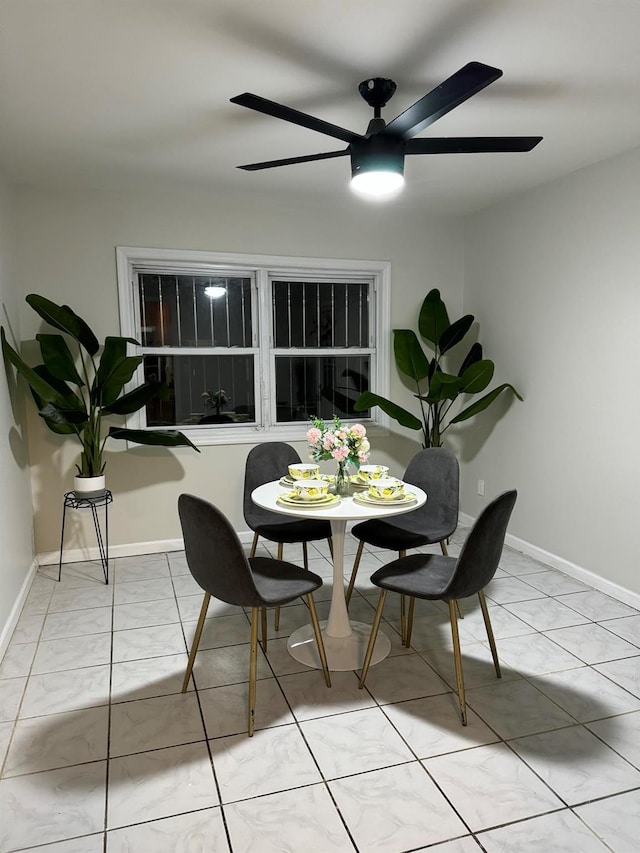 dining space with ceiling fan