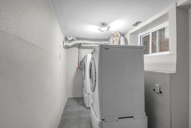 laundry area with washer and dryer