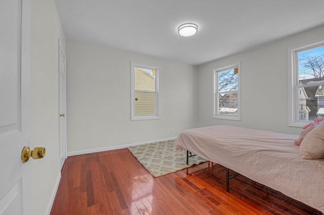 bedroom featuring wood-type flooring