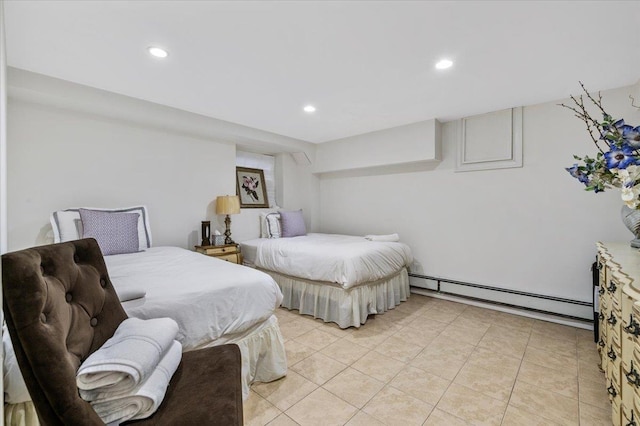 bedroom featuring a baseboard heating unit