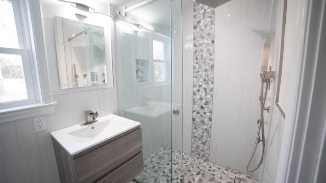 bathroom with vanity and walk in shower