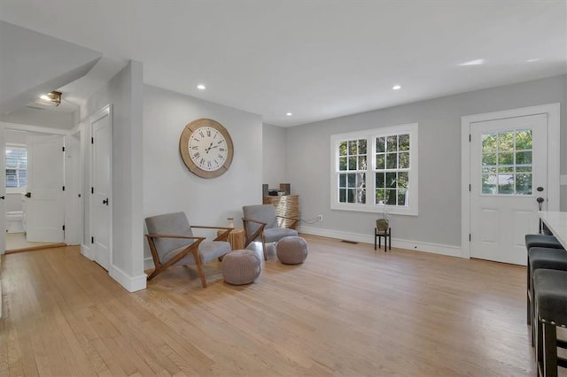 living area featuring light hardwood / wood-style flooring