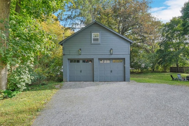 garage with a lawn