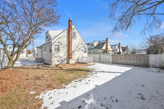 view of snow covered property