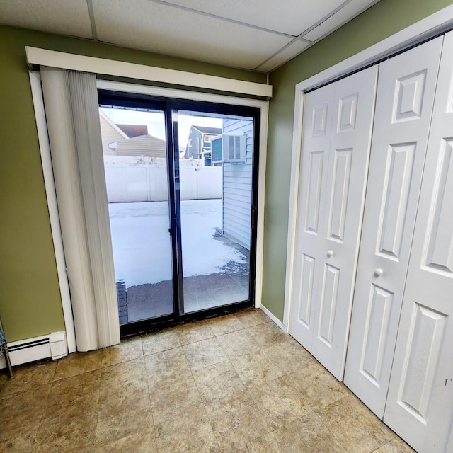 doorway with baseboard heating