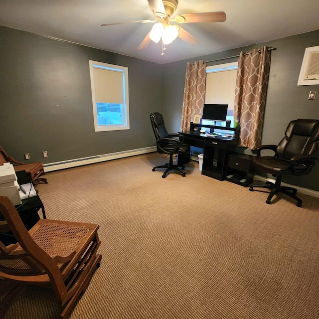 carpeted office space featuring baseboard heating and ceiling fan