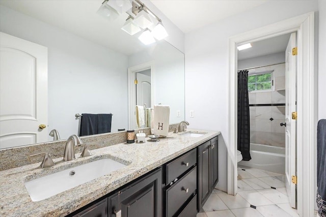 full bathroom featuring vanity, tile patterned flooring, toilet, and shower / bath combo