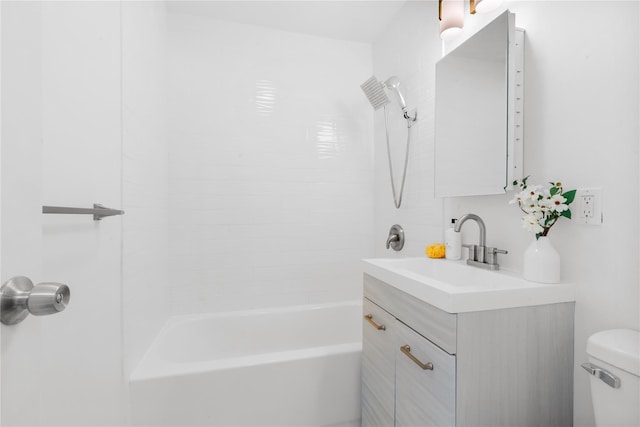 full bathroom featuring shower / bathtub combination, vanity, and toilet