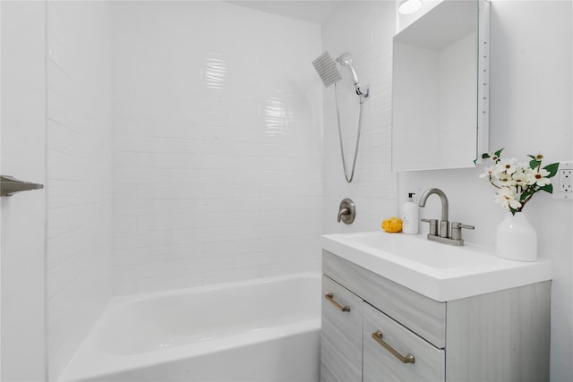 bathroom featuring shower / bathing tub combination and vanity