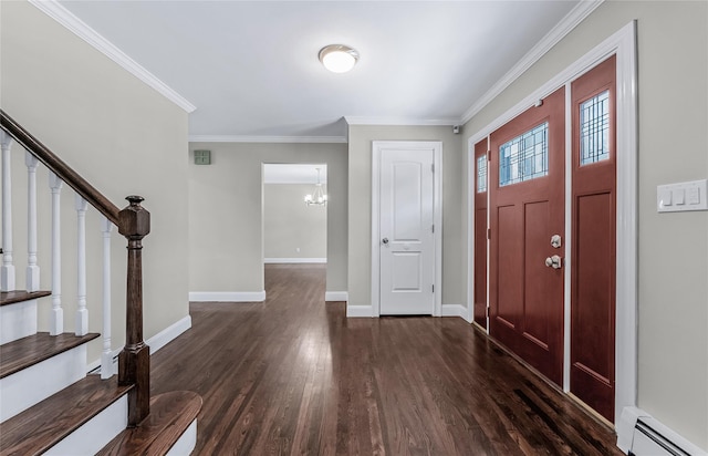 foyer entrance featuring crown molding, dark hardwood / wood-style floors, and a baseboard heating unit