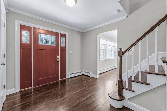 entryway featuring dark wood-type flooring, crown molding, and a baseboard heating unit