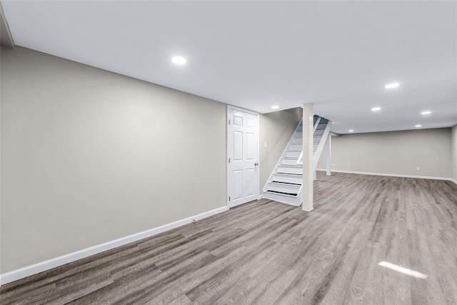 basement featuring light hardwood / wood-style floors