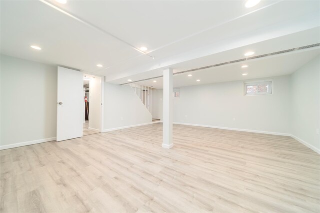 basement with light wood-type flooring