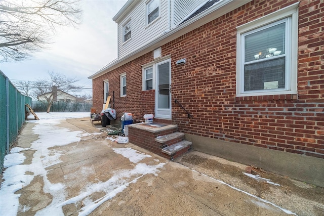 view of snow covered property