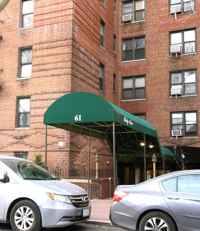 view of building exterior featuring cooling unit