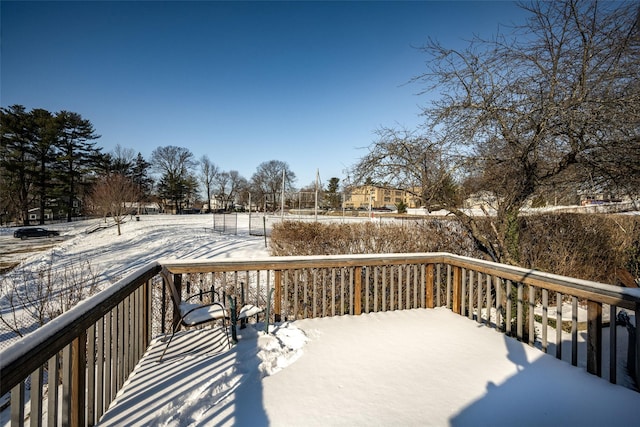 view of snow covered deck