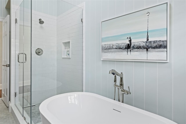 bathroom featuring independent shower and bath and tile patterned floors