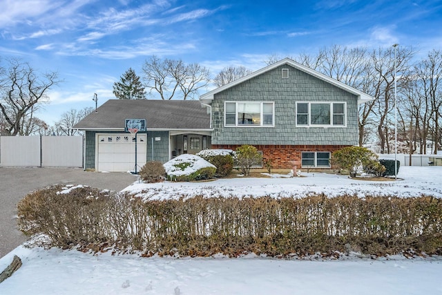 split level home with a garage