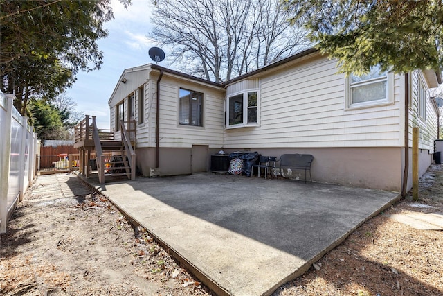 back of house with a patio area