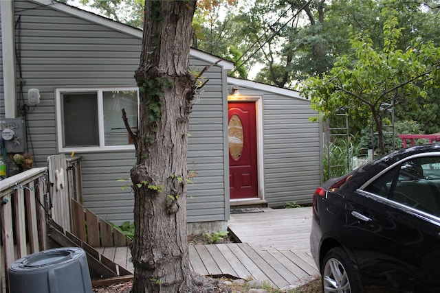 doorway to property with a deck