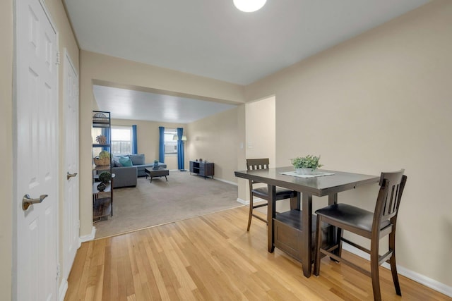 dining space featuring light hardwood / wood-style flooring