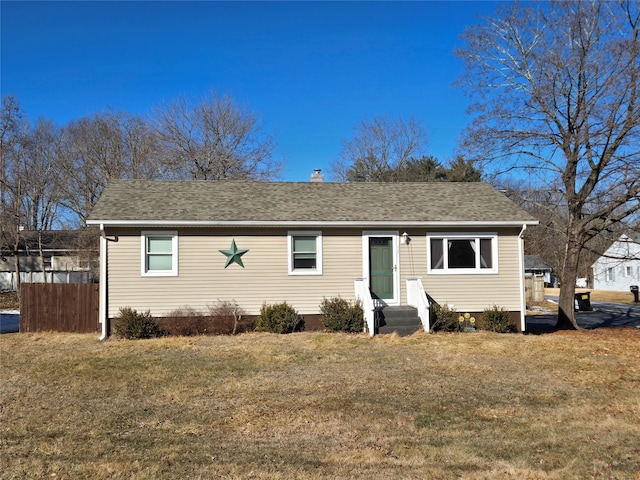 view of front of home with a front yard