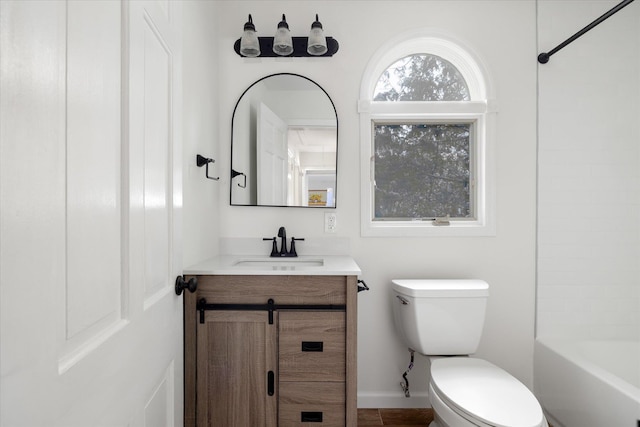 full bathroom with vanity, bathtub / shower combination, and toilet