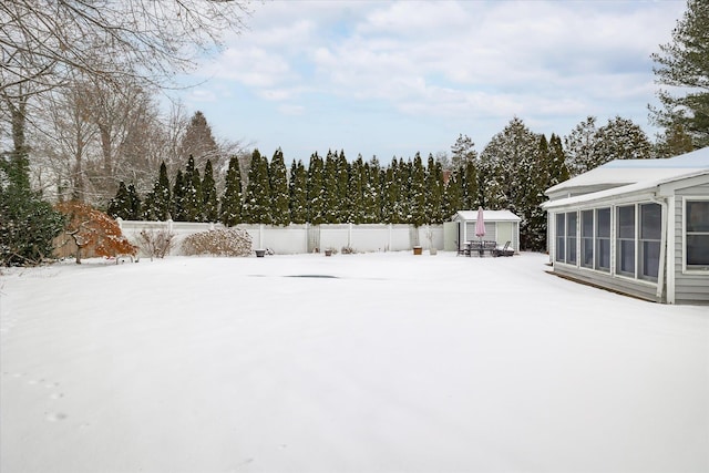 view of yard covered in snow