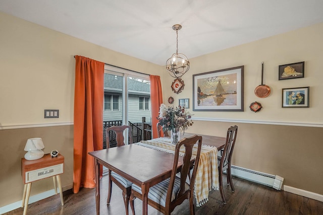 dining area featuring a baseboard radiator, dark hardwood / wood-style flooring, and a notable chandelier