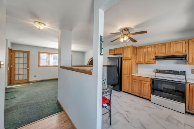 kitchen with black fridge, ceiling fan, and white electric range