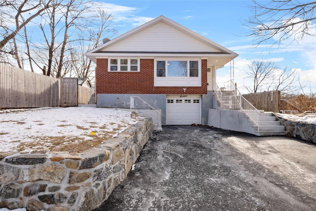 view of front of property featuring a garage