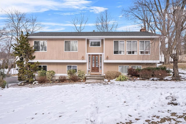 bi-level home featuring french doors