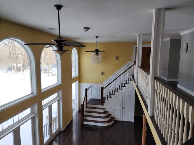 interior space with hardwood / wood-style floors, a wealth of natural light, and ceiling fan