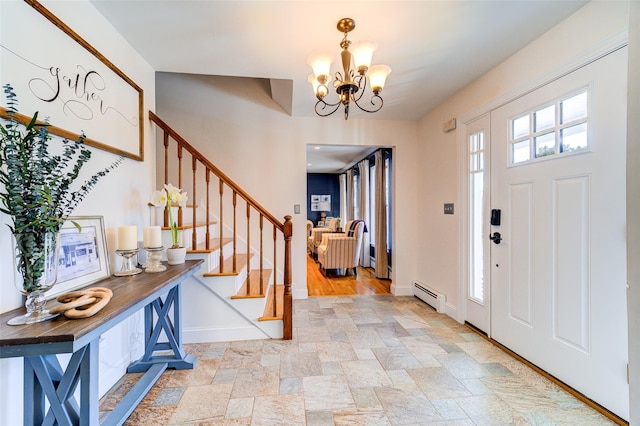 entrance foyer featuring a baseboard radiator and a notable chandelier