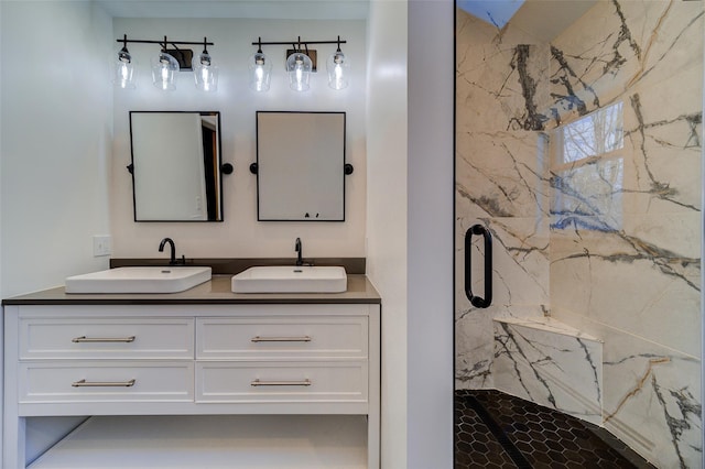 bathroom featuring vanity and a shower with shower door