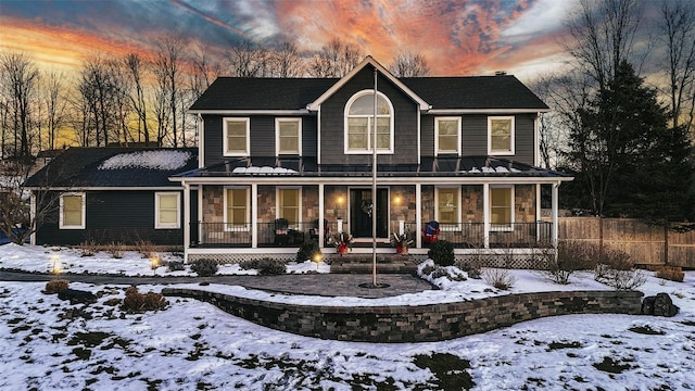 view of front of property featuring covered porch