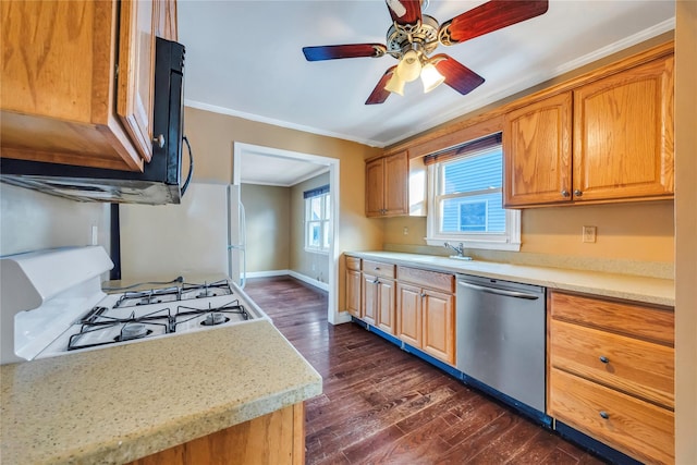 kitchen with sink, dark wood-type flooring, dishwasher, ornamental molding, and white gas range