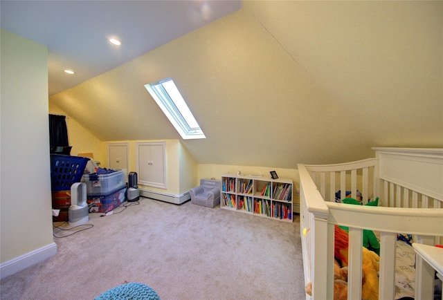 interior space with a crib and lofted ceiling with skylight