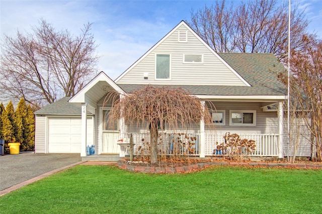 view of front of property with aphalt driveway, covered porch, a garage, a shingled roof, and a front yard