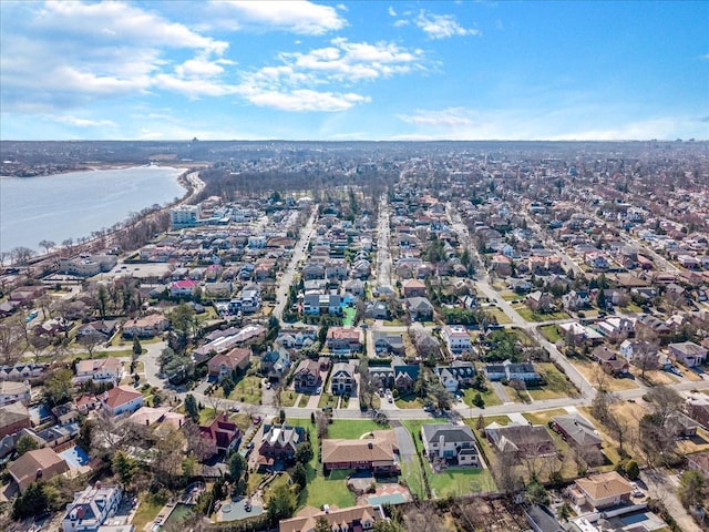 aerial view featuring a residential view and a water view