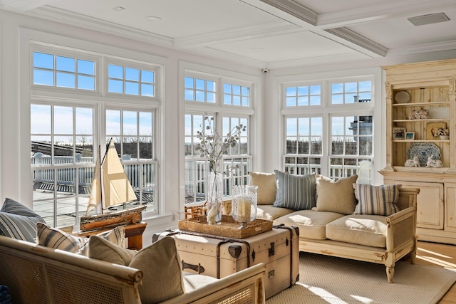 sunroom featuring coffered ceiling and beamed ceiling