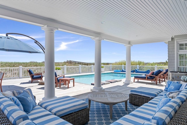 47 Dune Rd, East Quogue, NY 11942 - fenced backyard featuring an outdoor hangout area and a deck
